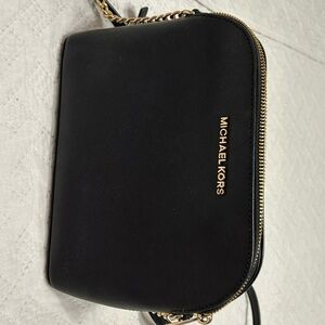 Michael Kors black shoulder bag.